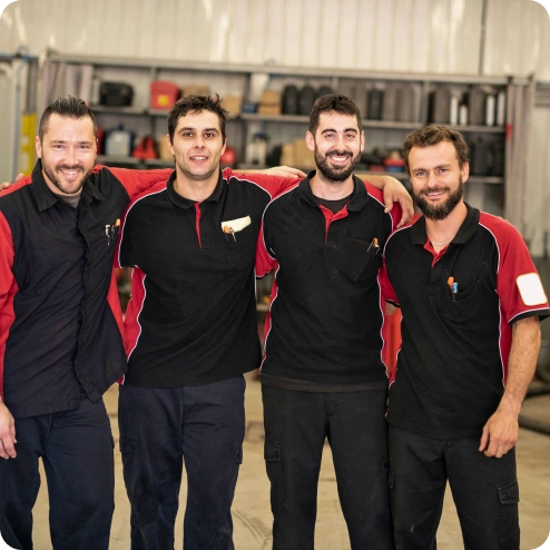 Équipe de collaborateurs en reunion dans un réseau de franchises